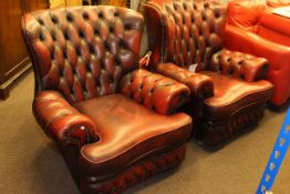 Pair deep buttoned ox blood leather armchairs