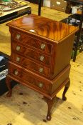 Mahogany four drawer pedestal chest on cabriole legs