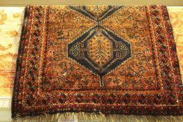 Afghan rug with a red ground 1.55 by 1.
