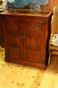 Old Charm carved and linen fold two door television cabinet,