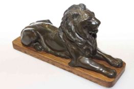 Desk piece in the form of a recumbent lion,