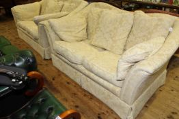 Pair of two seater settee in light yellow classical fabric