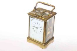 French brass cased carriage clock, stamped R & C, 12.