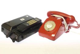 Vintage dial telephone and NEC EZ-2160-C handset portable telephone