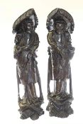 Large pair of Chinese carved and inlaid hardwood figures,