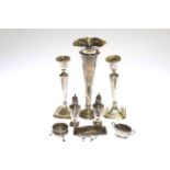 Eight pieces of silver including spill vase, pair of candlesticks, pair of pepperettes,