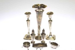 Eight pieces of silver including spill vase, pair of candlesticks, pair of pepperettes,