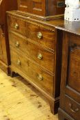 19th Century mahogany chest of two short above two long drawers on bracket feet,