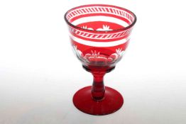 Red stained faceted glass goblet