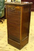 Early 20th Century slim tambour front filing cabinet,