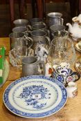 Tankards, blue and white and other plates, glass pieces, figure,