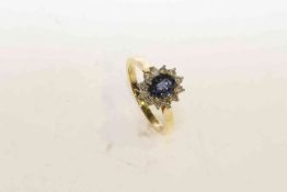 18 carat gold, oval sapphire and diamond ring, sapphire approximately 1 carat,