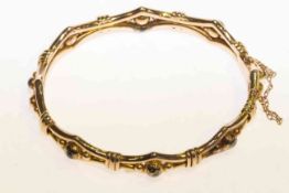 Late Victorian bangle, engraved J.A.P. 19.4.99, probably gold but unwarranted, 13.