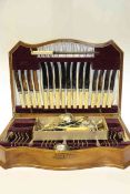 Walnut cased canteen of cutlery and box of assorted cutlery
