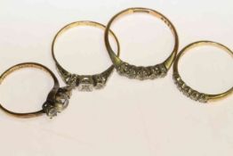 Two diamond rings and two gold rings set with white 'stones' (4) gross 8.