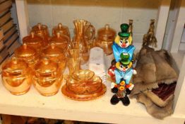 Collection orange lustre glass, two glass clowns, pair of brass horses, fur,