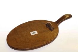 Early Mouseman oak cheeseboard, with carved mouse signature to the plate, 36.