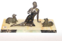 Art Deco figure group of lady and lambs on onyx base