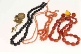 Graduated carnelian bead necklace, coral, jet,