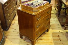 Late 19th/early 20th Century mahogany bachelors chest having brush slide above three long drawers