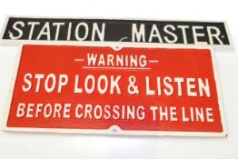 Two cast metal railway signs