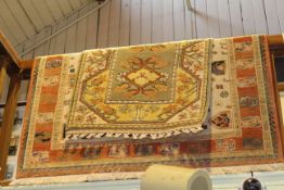 Two Persian design rugs 1.95 by 1.40 and 1.45 by 0.