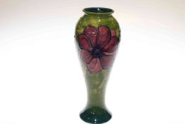 Large Moorcroft Pottery vase decorated with anemone on green ground,