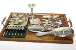 Collection of silver including brush, mirror, cased teaspoons, napkin rings, bud vase,