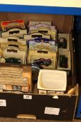 Box of model vehicles, two gauges by Griffin & George Ltd, pottery money box,