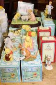 Collection of twelve Royal Doulton Winnie-the-Pooh pieces and two Bunnykins,