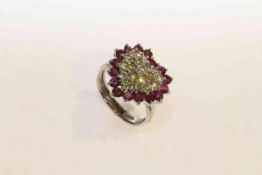 18 carat gold, ruby and diamond ring, with heart shaped mount,