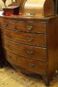 Regency mahogany bow front chest of two short above three long drawers on splayed bracket feet,
