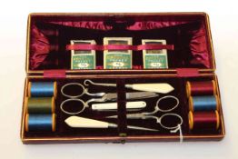 Vintage sewing set in a good gilt-lined leather case, 22.