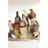Ten Royal Doulton bird whisky decanters and two Beswick bird decanters