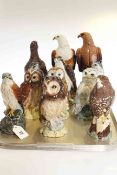 Ten Royal Doulton bird whisky decanters and two Beswick bird decanters