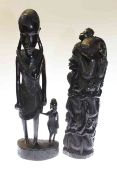 Two tribal figural carvings, 49cm and 43.