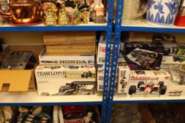 Collection of Tamiya F1 model kits and cars