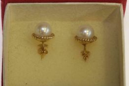 Pair of 14 carat gold and cultured pearl stud earrings