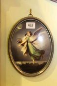 Framed oval porcelain plaque of an angel with a child in flight