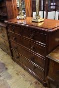 Victorian mahogany chest of two short above three long drawers on bun feet,