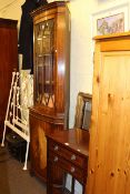 Mahogany bow front double corner cabinet, two drawer side table, tripod plant stand,