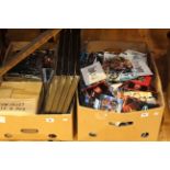 Two boxes of WWE Wrestling collectables