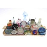 Collection of coloured glass including paperweights, vase, polar bear,