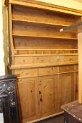 Large pine four door dresser and rack,