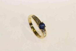 18 carat gold, round sapphire and channel set diamond shoulder ring, sapphire approximately 0.