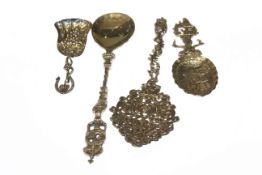 Four silver spoons, various marks and designs, 6.