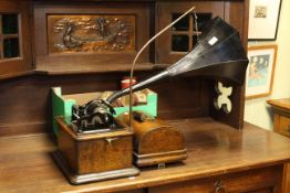 Edison standard phonograph with horn in oak case with twenty eight cylinders