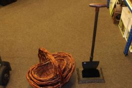 Three graduated wicker baskets and spade design foot cleaner