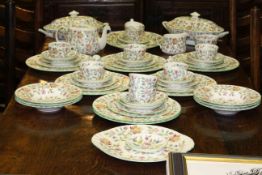 Over fifty pieces of Minton Haddon Hall dinner and teaware including two tureens