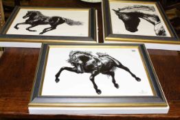 Three Royal Crown Derby black and white horse plaques,
